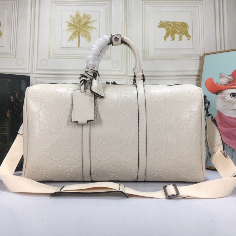 G*u*i travel bags